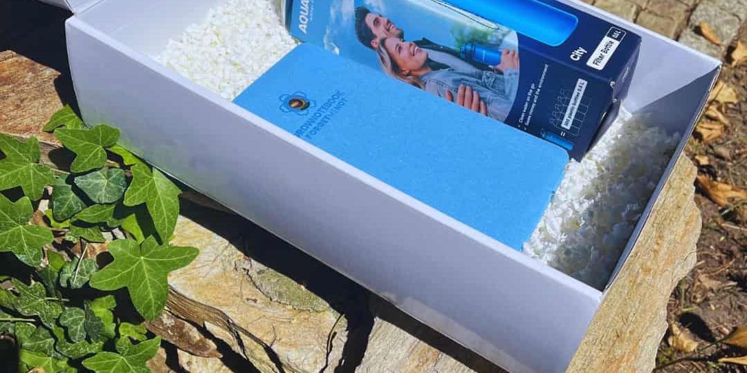 zestaw gadżetów reklamowych z personalizacją logo, eko butelka filtrująca, notes z nasionami DIY