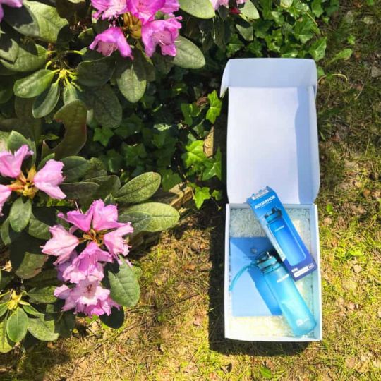 a gift box with blue gadgets